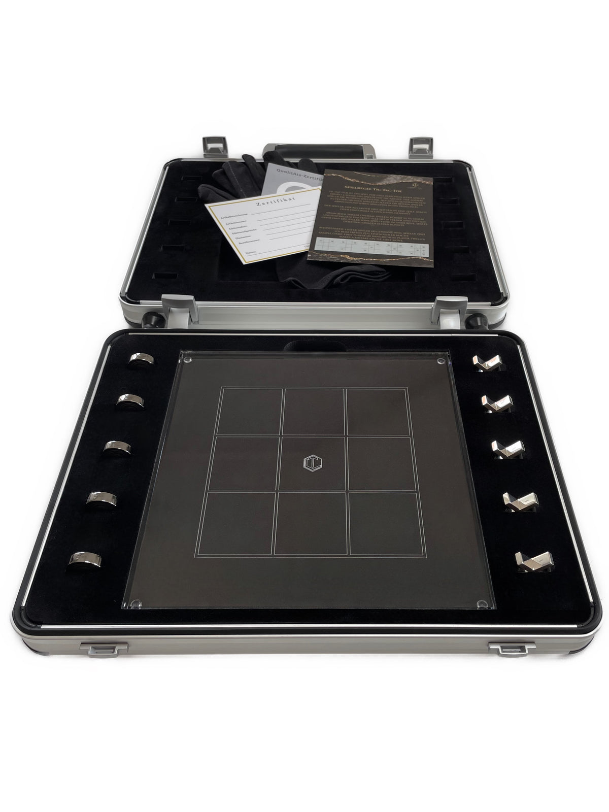 Tic-Tac-Toe board game with 10 solid 925 sterling silver game pieces, 5 pieces black rhodium-plated, with an acrylic glass board, presented in a first-class case